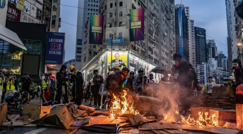 Violent protests continue in Hong Kong after anti-mask law comes into effect