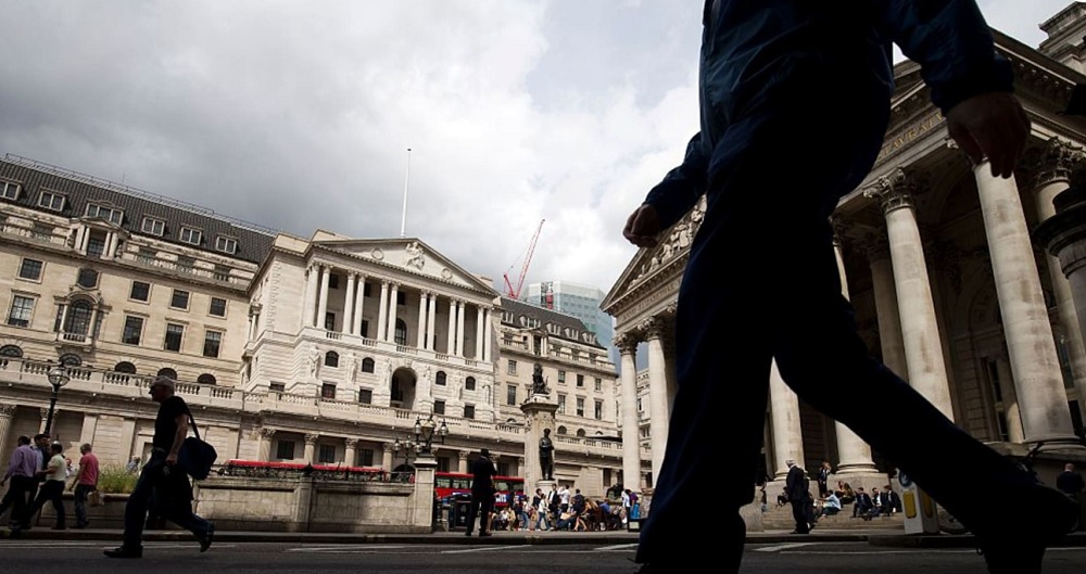 Sterling falls after Bank of England split on interest rate cut