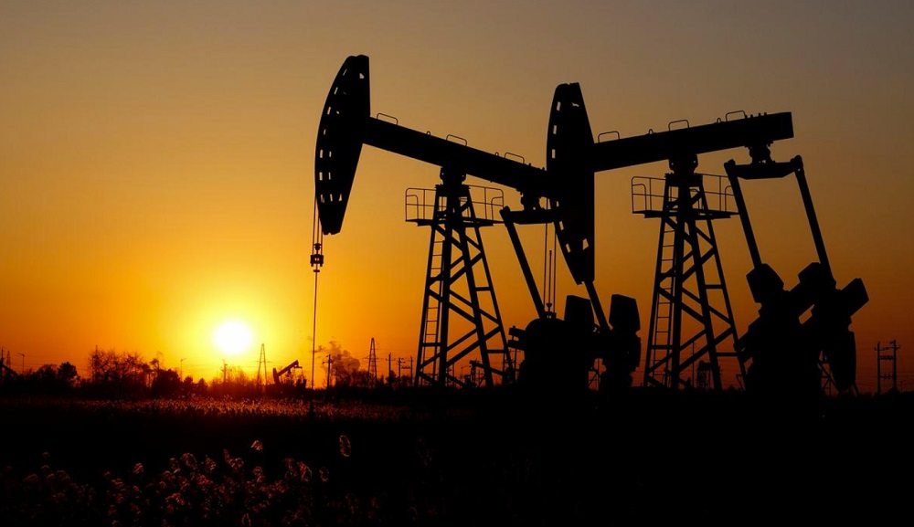 Oil skids as U.S. inventories pile up, but demand hopes stem bigger drop